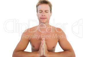 Man doing yoga and meditating