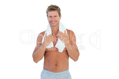 Shirtless man with a towel around his neck