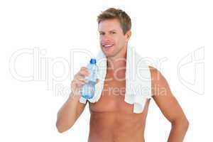 Thirsty man holding a bottle of water