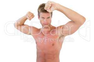 Shirtless attractive man showing his biceps