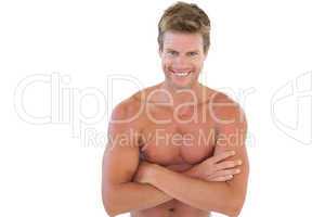 Shirtless man with arms crossed