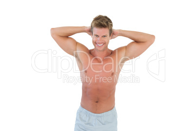 Shirtless man with hands on head