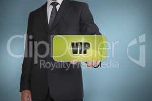 Businessman selecting green label with vip written on it
