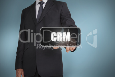 Businessman touching the word crm