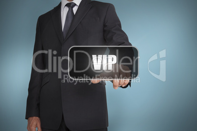 Businessman touching the word vip