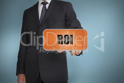 Businessman selecting orange tag with roi