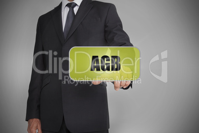 Businessman selecting green tag with the word agb written on it