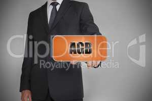 Businessman touching orange tag with the word agb written on it