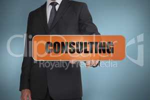 Businessman touching the word consulting