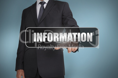 Businessman touching the word information written on black tag