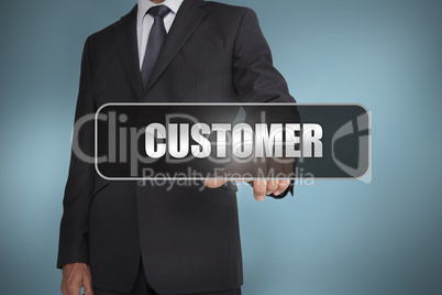 Businessman touching the word customer written on black tag