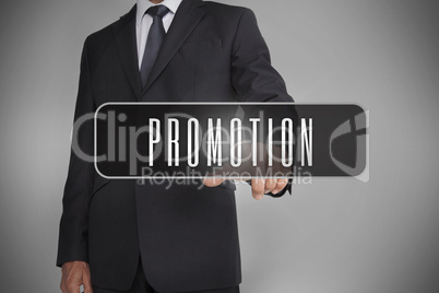 Businessman selecting label with promotion written on it