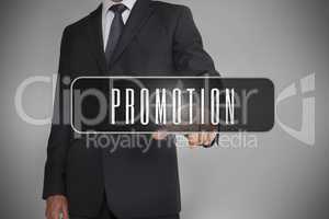 Businessman selecting label with promotion written on it