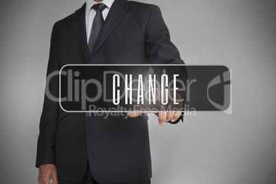 Businessman selecting label with change written on it