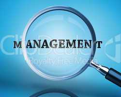 Magnifying glass showing management word