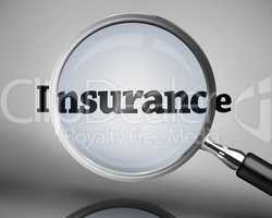Magnifying glass showing insurance word