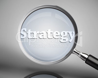 Magnifying glass showing strategy word in white