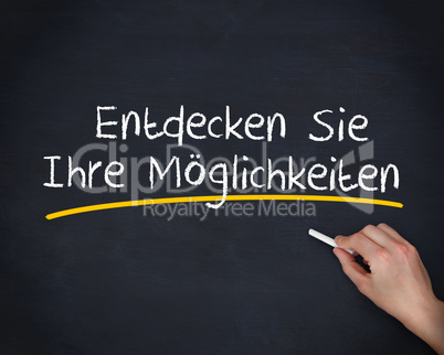 Hand writing entdecken sie ihre moglichkeiten with a chalk