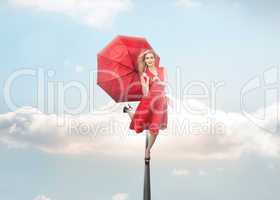 Attractive woman holding umbrella