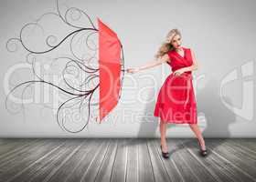 Beautiful woman holding a broken umbrella