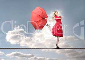 Beautiful woman standing on rope
