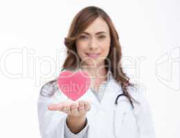 Doctor holding a pink heart