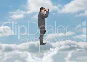 Businessman on ladder over the clouds