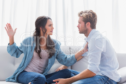 Woman about to slap her partner