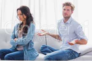 Woman with arms crossed back to her partner