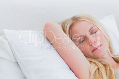 Peaceful blonde woman sleeping