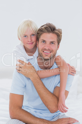 Portrait of handsome father with son