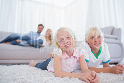 Children lying on the carpet