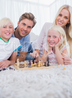 Family playing chess