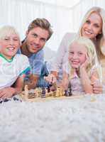 Family playing chess