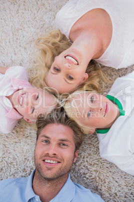 Family lying in a circle