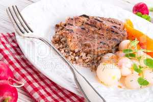 grill chop, buckwheat groats and roasted radishes