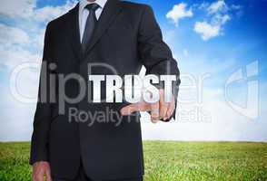Businessman selecting trust word