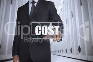 Businessman in a data center selecting label with cost