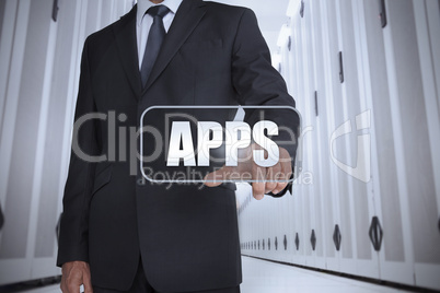 Businessman in a data center selecting label with apps
