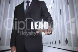 Businessman in a data center selecting label with lead