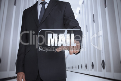 Businessman in a data center selecting label with mail