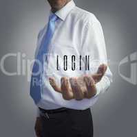 Businessman holding the word login