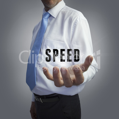Businessman holding the word speed