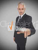 Businessman selecting the word change