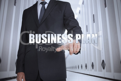 Businessman selecting the term business plan