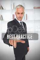 Serious businessman touching the term best practice