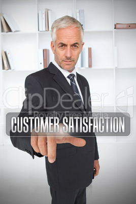 Businessman selecting the term customer satisfaction