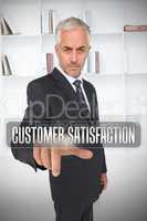 Businessman selecting the term customer satisfaction