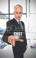 Businessman selecting the word cost