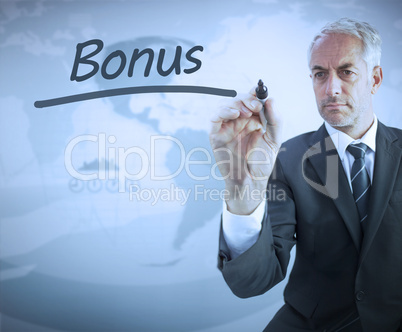 Businessman writing the word bonus